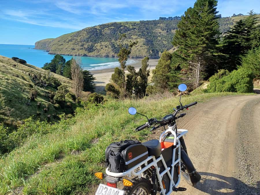 Akaroa: Lonely Beach Trail by E-Scooter. selfguided day out - Takamatua Valley Wines and a relaxed finish