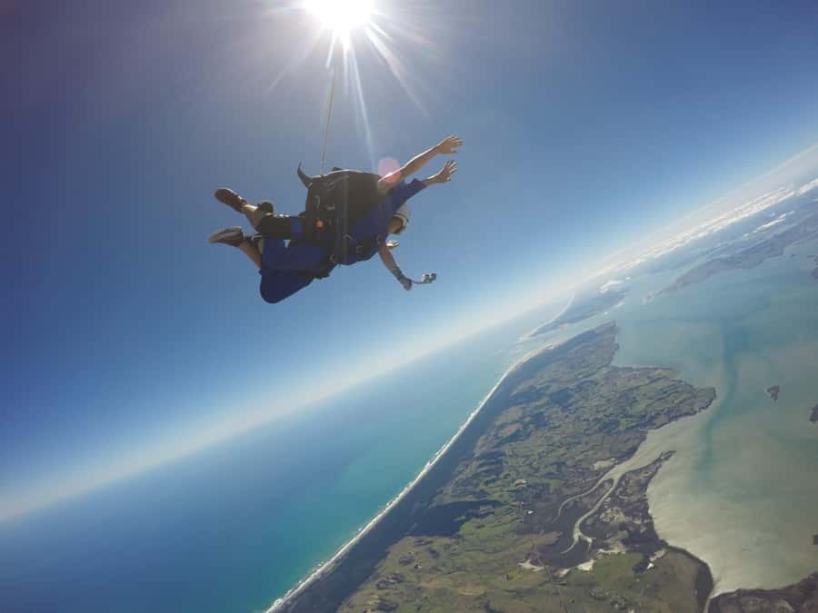 Auckland: 13000, 16000, or 18000-Foot Tandem Skydive - Landing, photos, and video