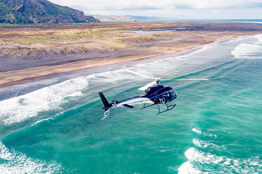 Auckland: 36 min scenic helicopter flight - Coast to Coast - Bethells Beach and the black sand coast