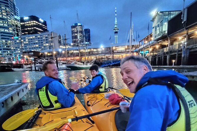 Auckland City Lights Night Kayaking Tour - The Sky Tower reflection and the best photo moments