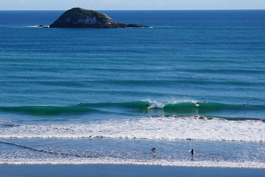 Auckland: Group Surfing Lesson with Muriwai Surf School - What to pack for a comfortable session