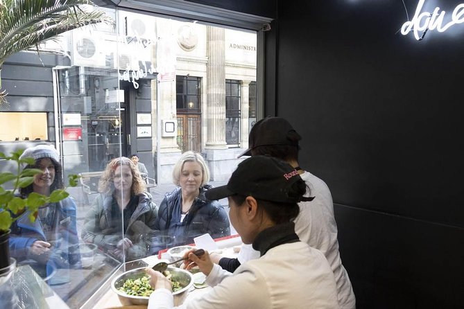 Auckland Small-Group Walking Tour with Treats - Queens Arcade reveals the city’s shopping character