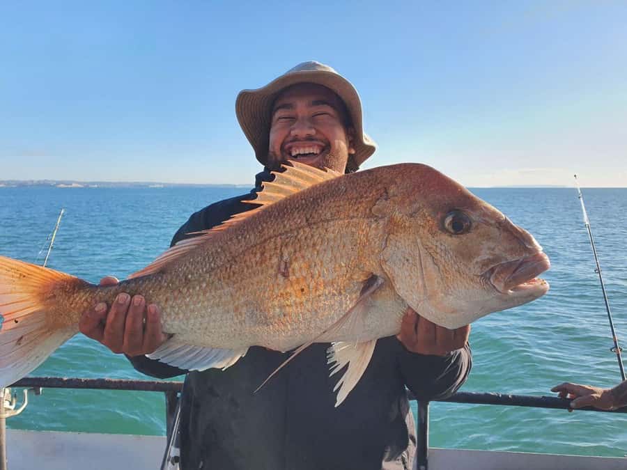 Auckland: Twilight Fishing Charter 5pm - 9:30pm - Fishing Auckland’s Hauraki Gulf after 5pm