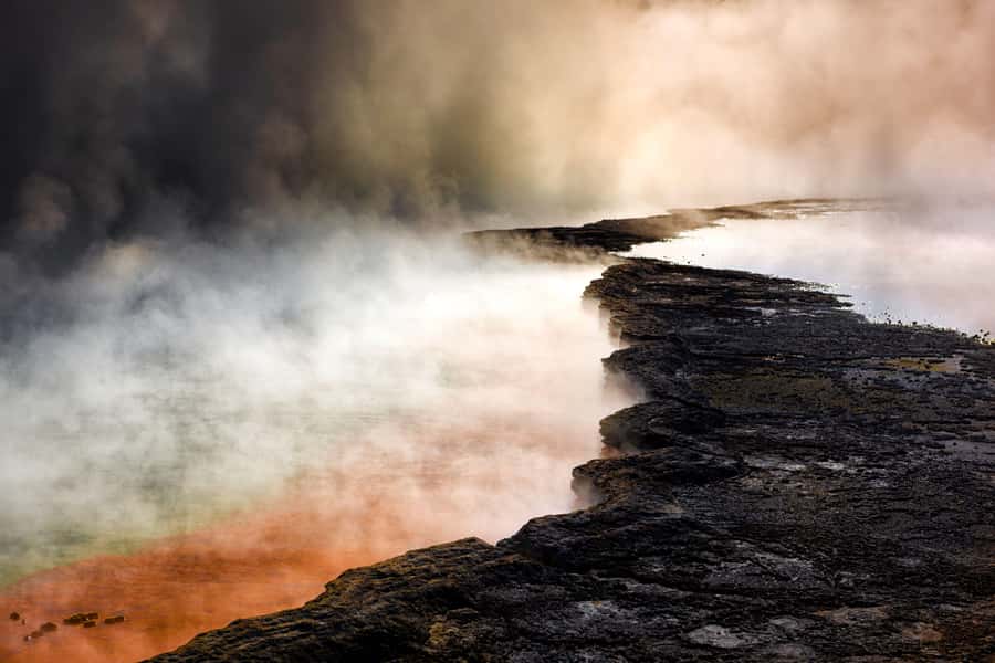 Auckland: Wai-O-Tapu, Maori Haka & Hot Springs Rotorua Tour - Walking through Wai-O-Tapu’s colored geothermal pools