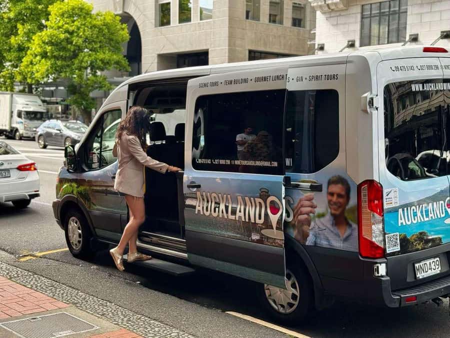Auckland: Wine region tour with tastings and gourmet lunch - Crossing the Harbour Bridge into Auckland wine country