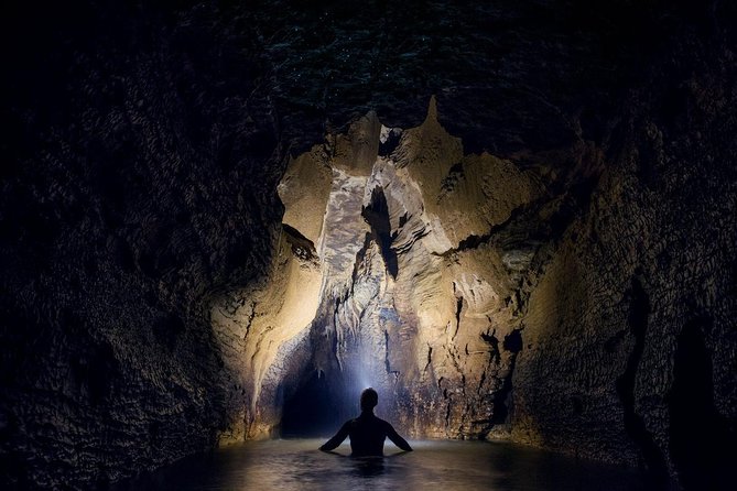 Black Abyss: Ultimate Waitomo Caving - Private Tour from Auckland - Flying fox, tubing, and the cold underground river