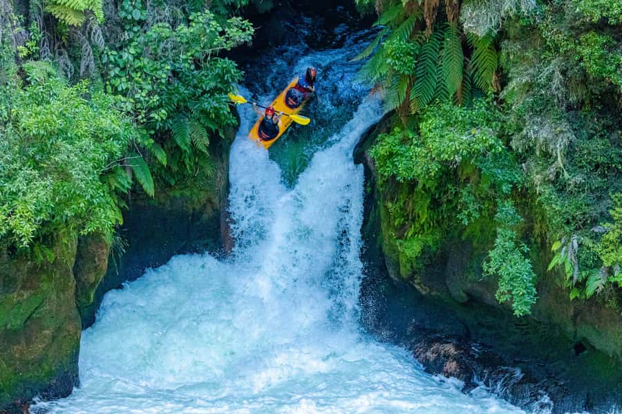 Epic Tandem Kayak Tour down the Kaituna River Waterfalls - Into the native bush-lined gorge