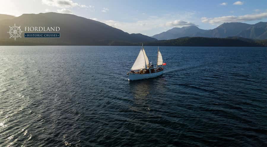 Evening Champagne Cruise on Historic 1935 Motor Yacht. - Cruising Lake Te Anau in the evening light