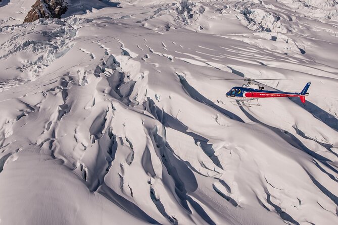 Fox Glacier Mountain Scenic Spectacular 40-Min Helicopter Flight - Franz Josef Glacier and the blue ice below