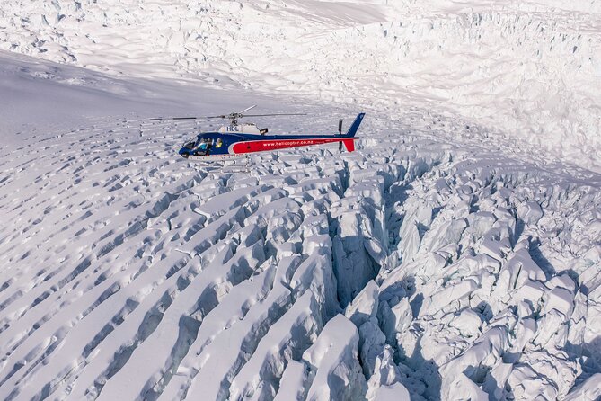 Fox Glacier: Neve Discoverer Helicopter Flight with Snow Landing - Seeing Fox Glacier from the air