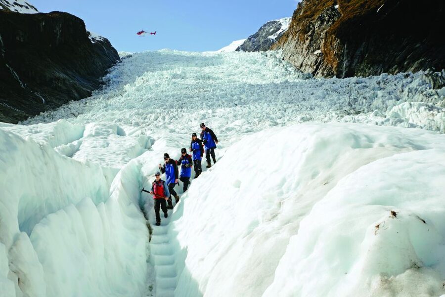 Fox Glacier: Up to 3 Hours Hike with Helicopter Transfer - Ice caves, arches, and the glacier’s working parts