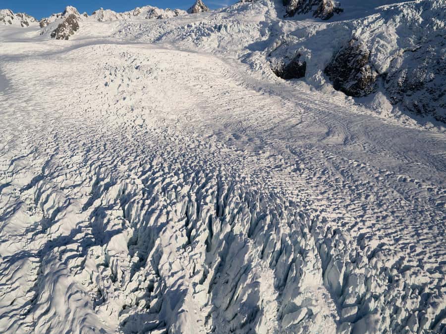 Franz Josef: 30-min Flight Franz Josef & Tasman Glaciers - Standing on New Zealand’s longest glacier