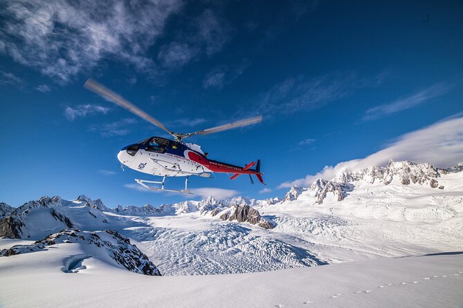 Franz Josef: Twin Glacier Helicopter Flight with Snow Landing - Meeting the helicopter in Franz Josef