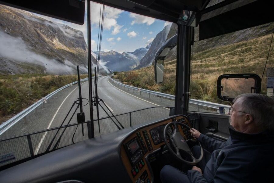 From Te Anau: Milford Sound Cruise & Glass-Roof Coach Tour - Mirror Lakes and the art of a quick photo stop