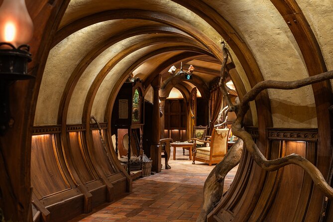 Hobbiton Movie Set Guided Day Tour with Lunch from Auckland - Walking through the 1,250-acre sheep farm