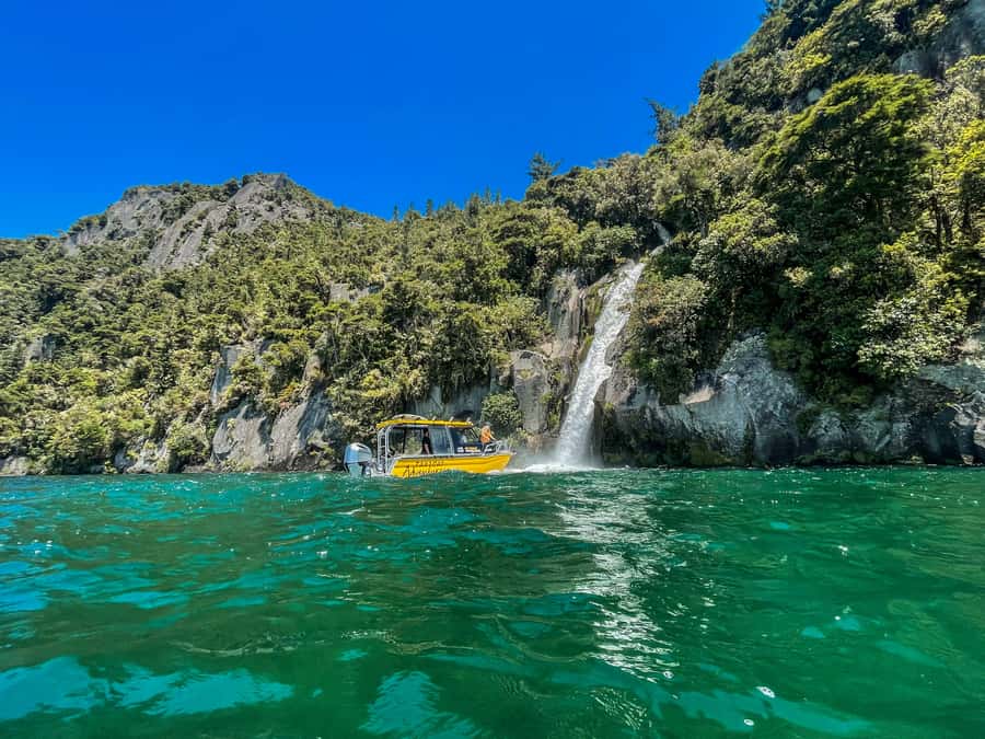 Kinloch: Lake Taupo Catamaran Cruise with Paddleboarding - The first 90 minutes: cliffs, ravines, and waterfalls