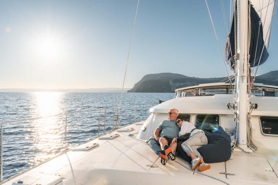 Lake Taupo: Luxury Sailing Catamaran to Māori Rock Carvings - Swimming in the cold, clear lake