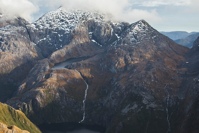 Milford Sound Grand Tour Helicopter Scenic Flight Departing from Milford Sound - Mitre Peak and the Milford Sound opening view