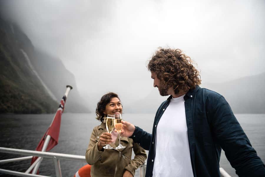 Milford Sound: Premium Small Group Cruise with Canape Lunch - Arriving at Milford Sound and boarding MV Sinbad