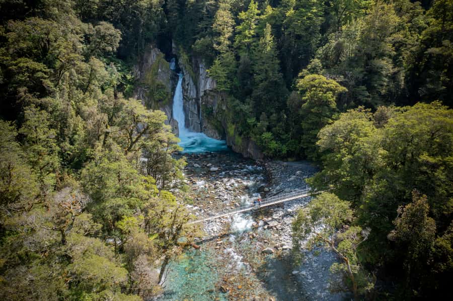 Milford Track: Full Day Guided Hike and Nature Cruise - Giant Gate Waterfall and the swing bridge