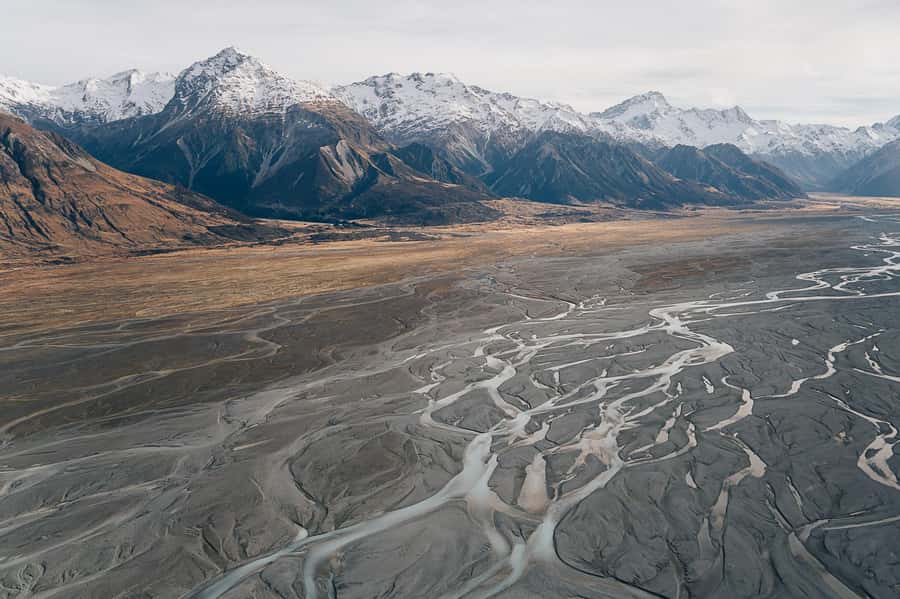 Mount Cook: 25-Minute Alpine Vista Helicopter Flight - Taking off above Lake Pukaki
