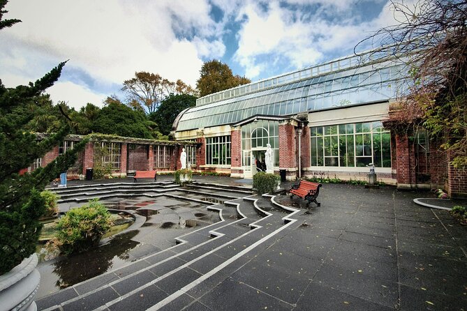 Private Auckland City Highlights Tour - Mission Bay and the view toward Rangitoto