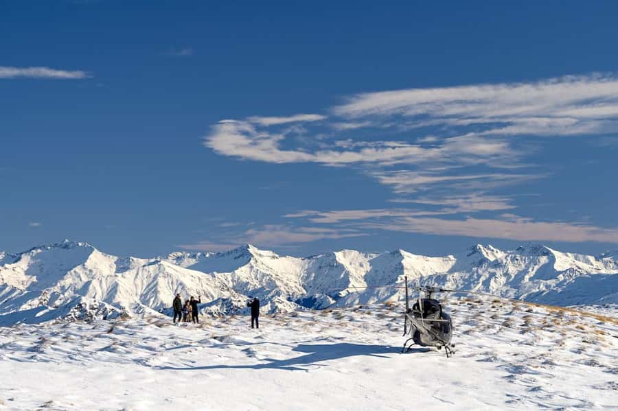 Queenstown Helicopter Flight with Snow Landing | 30 mins - Landing in the alpine snow