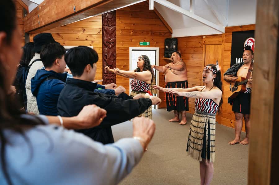 Rotorua: Māori Cultural Performance with Dancing - Poi dancing and stick games add rhythm