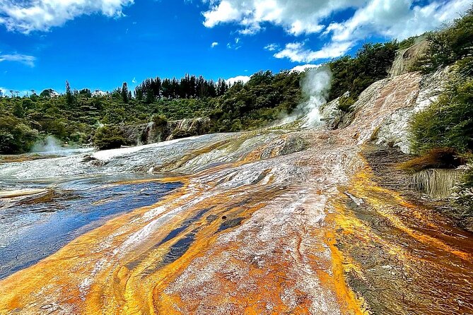 Self-Guided Geothermal Tour in Orakei Korako - Silica terraces, steam and close-up color