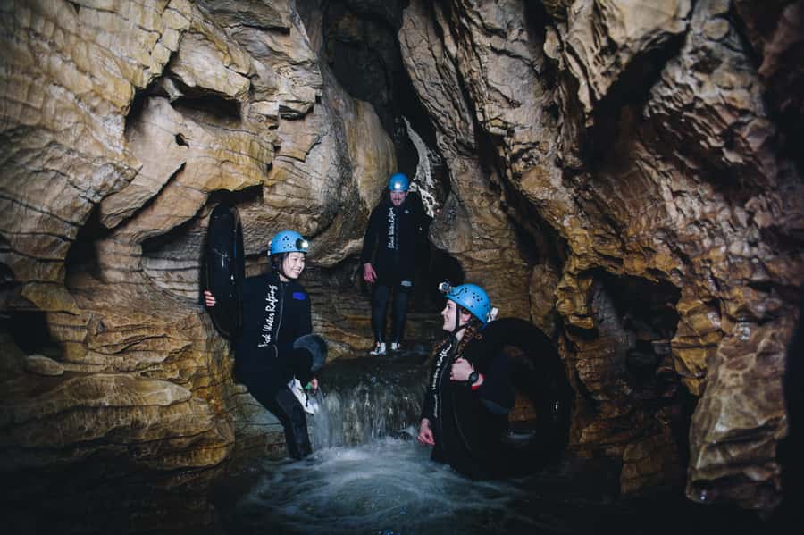 Waitomo Caves: Labyrinth Black Water Rafting Experience - Scrambling through Ruakuri Cave