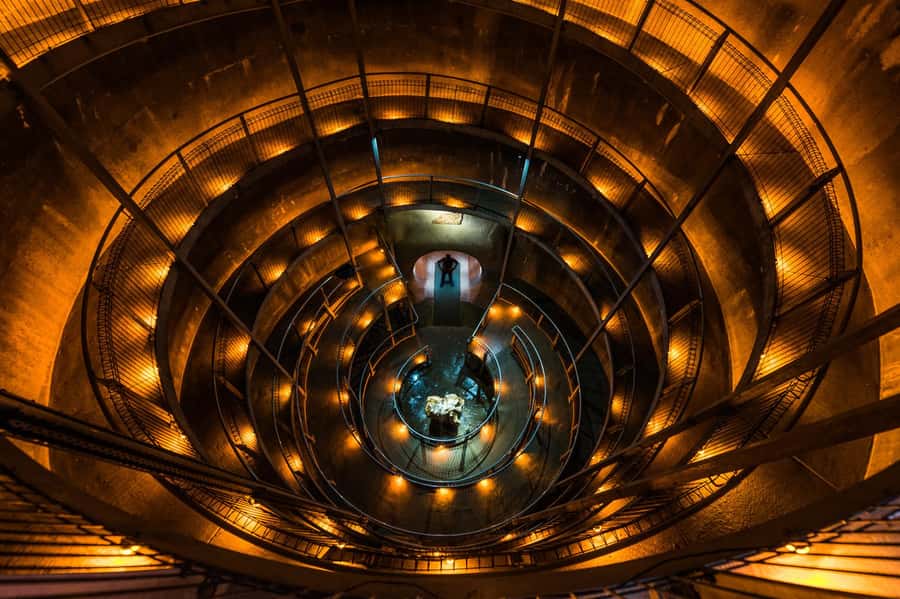 Waitomo Caves: Ruakuri Glowworm Cave Guided Walking Tour - The spiral entrance sets the tone