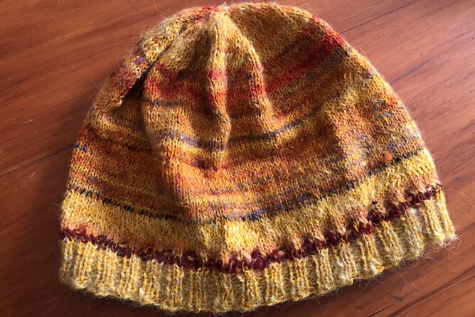 Wool Sheep Farm Experience with Handmade Wool Hat in New Zealand - Who will get the most from this farm experience